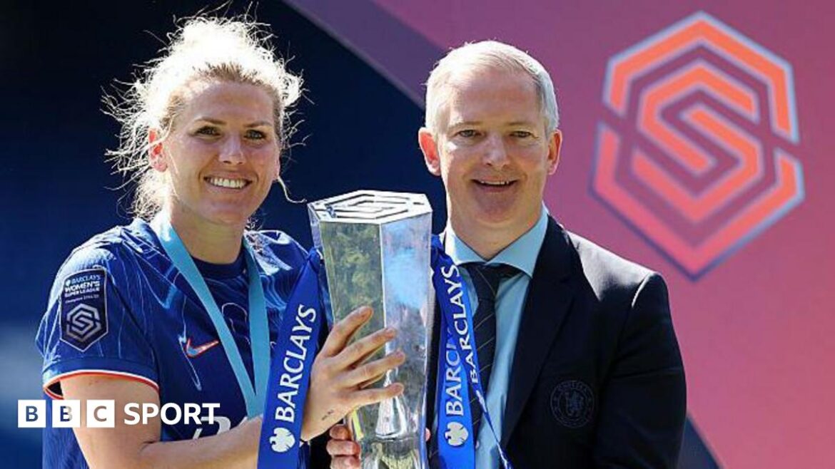 Paul Green alongside Chelsea captain Millie Bright 