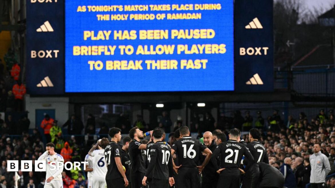 The big screen at Elland Road displays a message explaining that the game against Manchester City will be stopped to allow players to break their fast to take on water and energy as they observe Ramadan