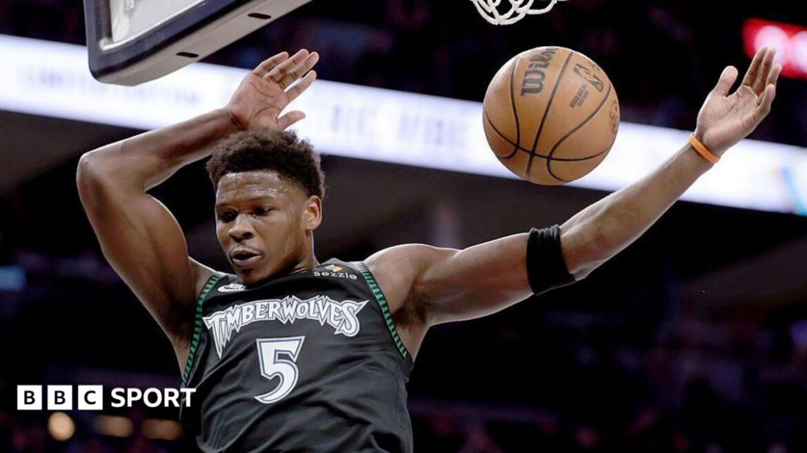 Minnesota Timberwolves guard Anthony Edwards dunks the ball against the San Antonio Spurs